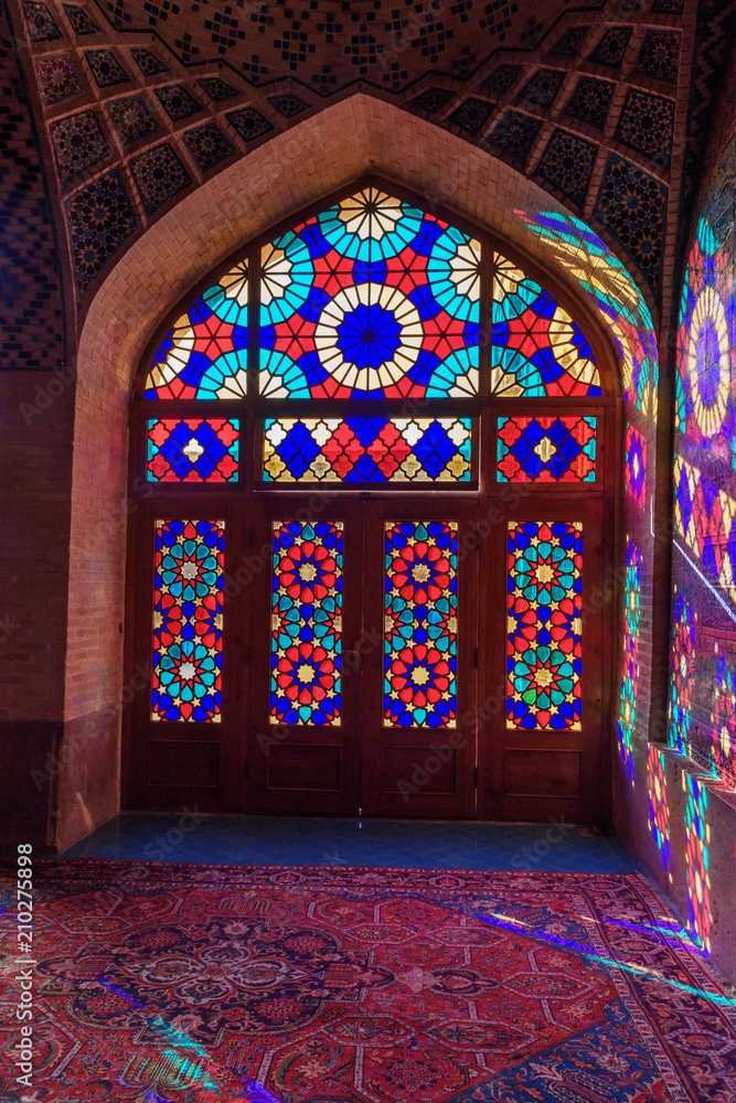 Stained glass window of Nasir Ol-Molk mosque, also famous as Pink Mosque. Shiraz. Iran