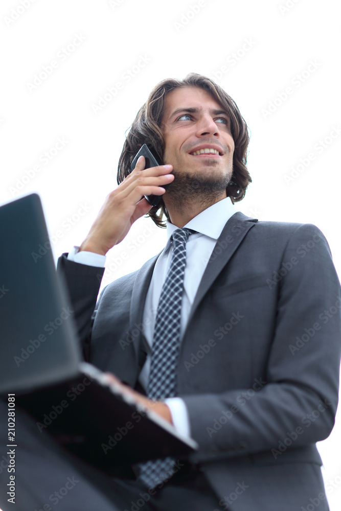 closeup.successful businessman talking on the phone closeup.successful businessman talking on the phone
