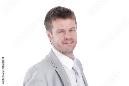 portrait of young businessman in a gray suit. © ASDF