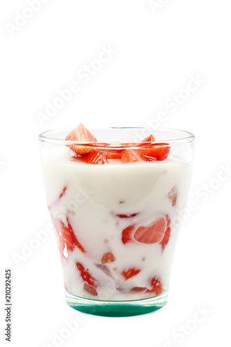 Fresh strawberry with sour cream in a bowl