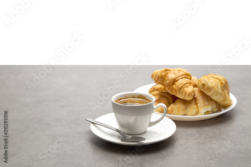 Fototapeta Naklejka Na Ścianę i Meble -  Cup of fresh coffee with croissants on dark background