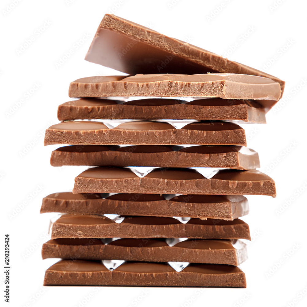Chocolate tiles and nuts on white background Chocolate tiles and nuts on white background