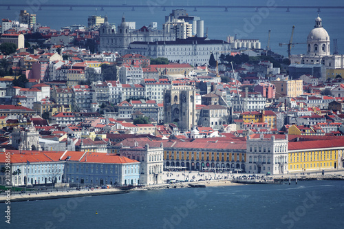 Long shot of Lisbon with cathedral, pantheon, Comercio plaza and river