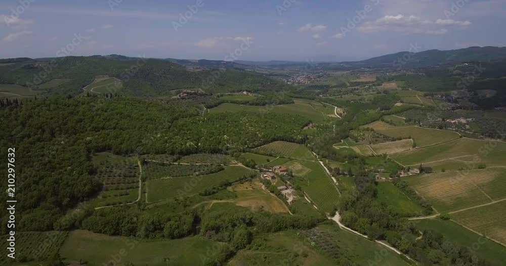 Aerial, beautiful green vineyards in Tuscany hills in Italy Aerial, beautiful green vineyards in Tuscany hills in Italy