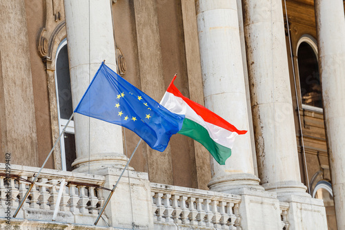 Photography Flag of Hungary and the European Union on the Royal Castle building in Budapest