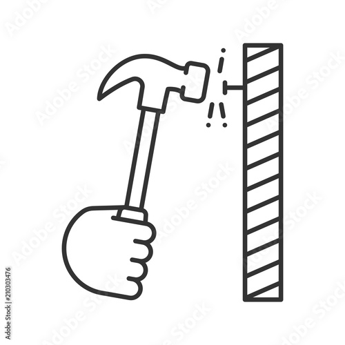 Hand hammering nail linear icon