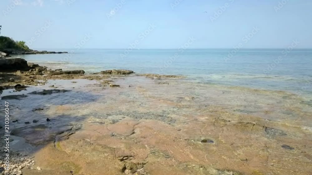 Peaceful water of the sea. It's a really nice day. Summer time. Peaceful water of the sea. It's a really nice day. Summer time.