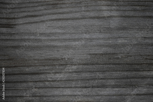 Wood texture. Dark Grey scratched wooden cutting board. Natural Gray Background..