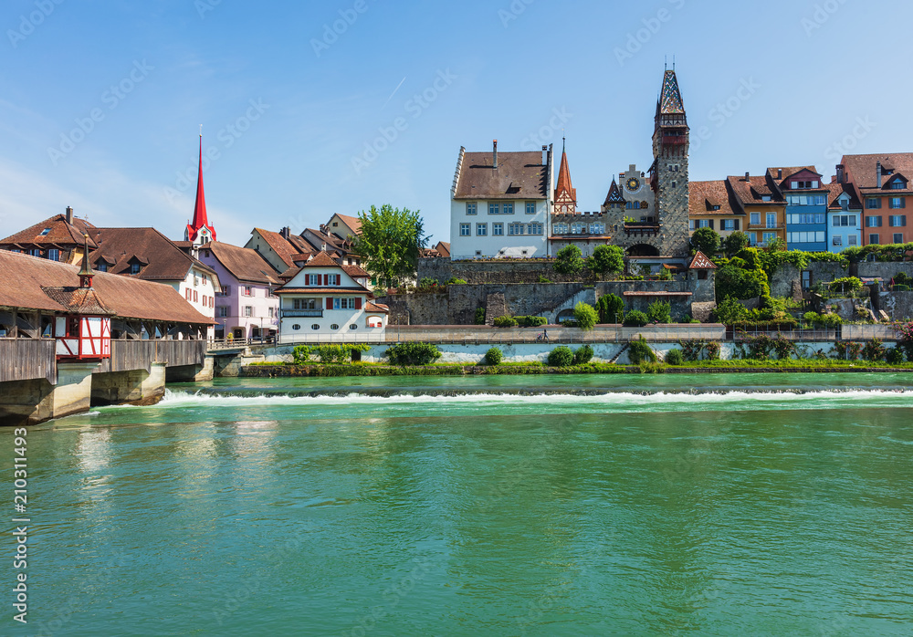 Buildings of the Swiss town of Bremgarten along the Reuss river