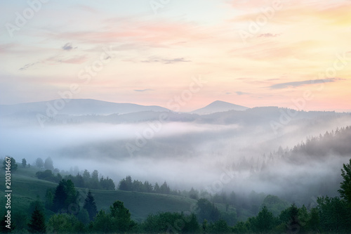 Foggy sunrise in the mountains