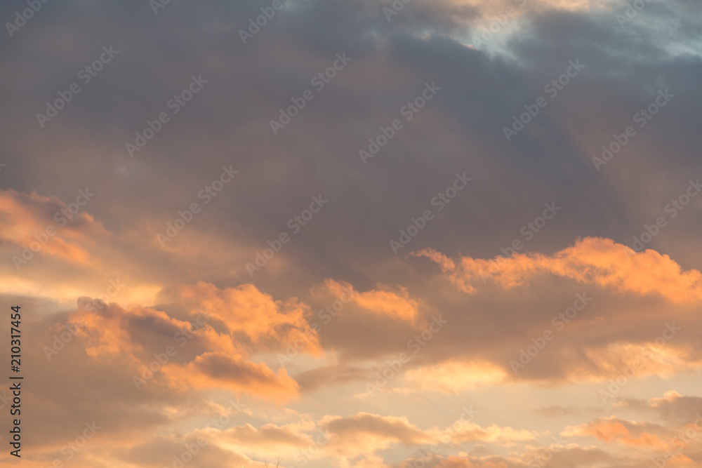 Cloudy sunset with blue and orange colors.