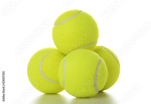 Stack of tennis balls isolated © eyewave