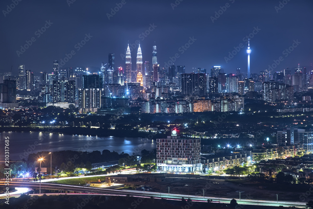 Panorama .view in the middle of Kuala Lumpur cityscape skyline .Night scene , Malaysia .