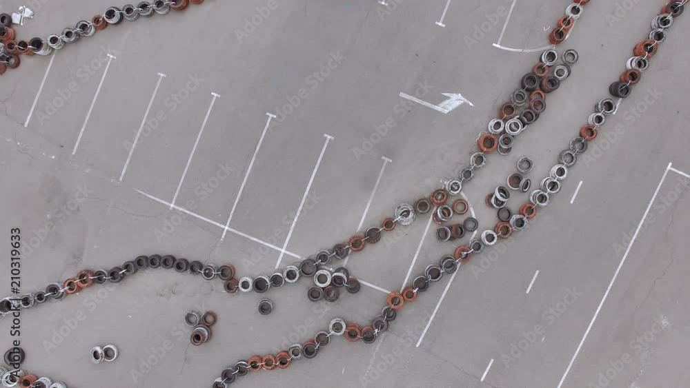 Camera moves up revealing karting track with racing karts