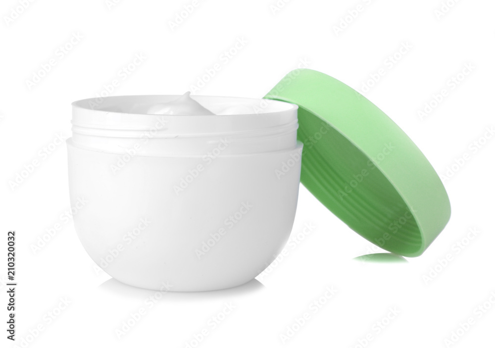 Face cream in a white jar with a green lid on a white background. isolated Face cream in a white jar with a green lid on a white background. isolated