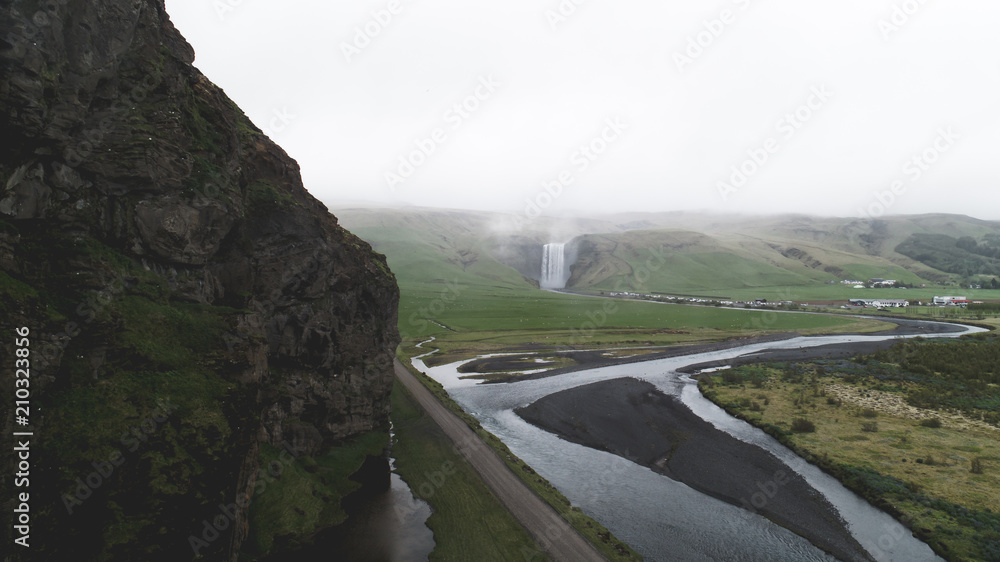 aerial view of skogafoss with cliff and river iceland aerial view of skogafoss with cliff and river iceland