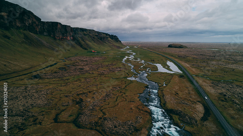aerial view of river with big cliffs in iceland photo