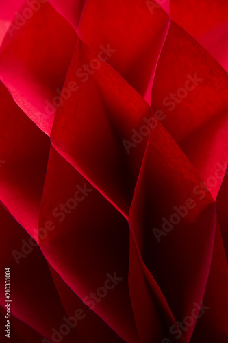 Detail of the red honeycomb paper ball decoration