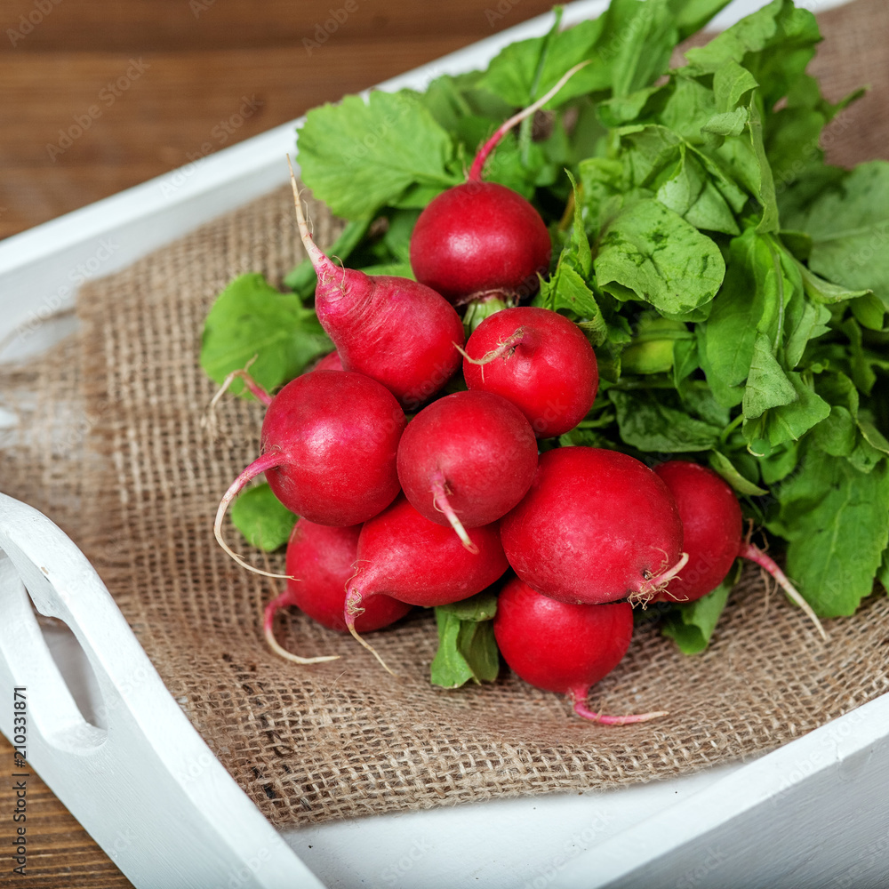 Tasty radish. Square. The concept of healthy eating and vegetarianism. Tasty radish. Square. The concept of healthy eating and vegetarianism.