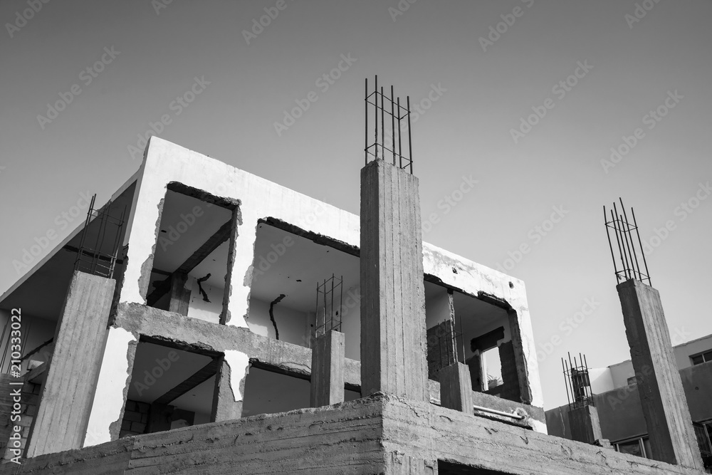 Gray concrete building is under construction