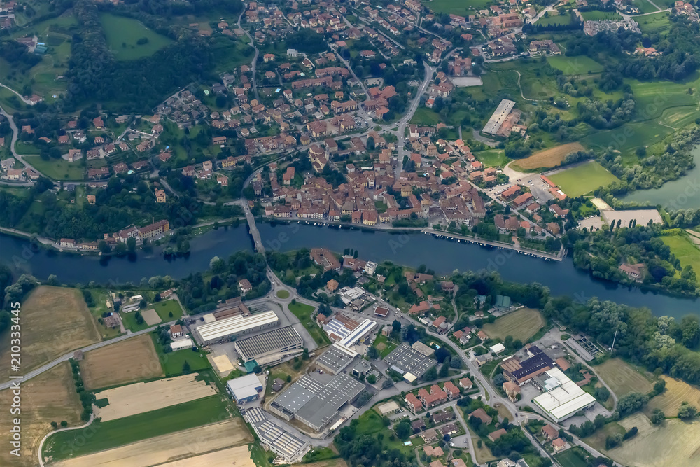 aerial of Brivio village on Adda river , Italy