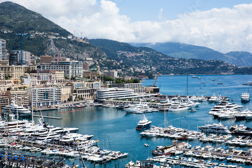 Monte-Carlo, Beautiful View of Luxury Yachts, Boats and Apartments in harbor of Monaco photo
