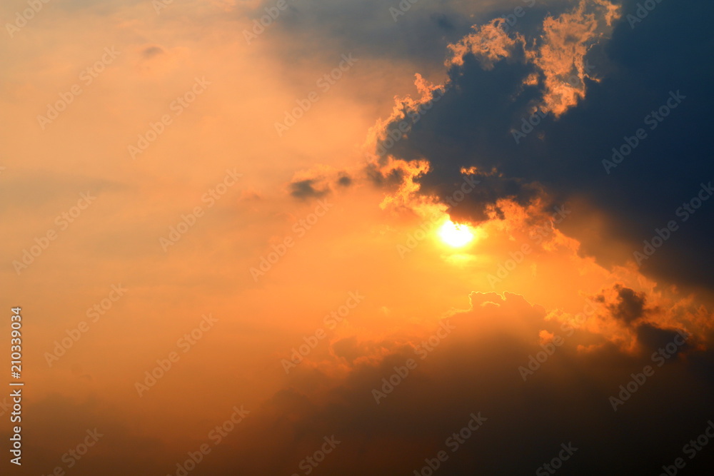 sunset, orange sky sun sets over cloud dark, gold sky sun lighten clouds evening