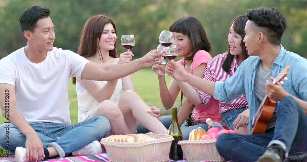 Asian Young friends go picnic together Asian Young friends go picnic together