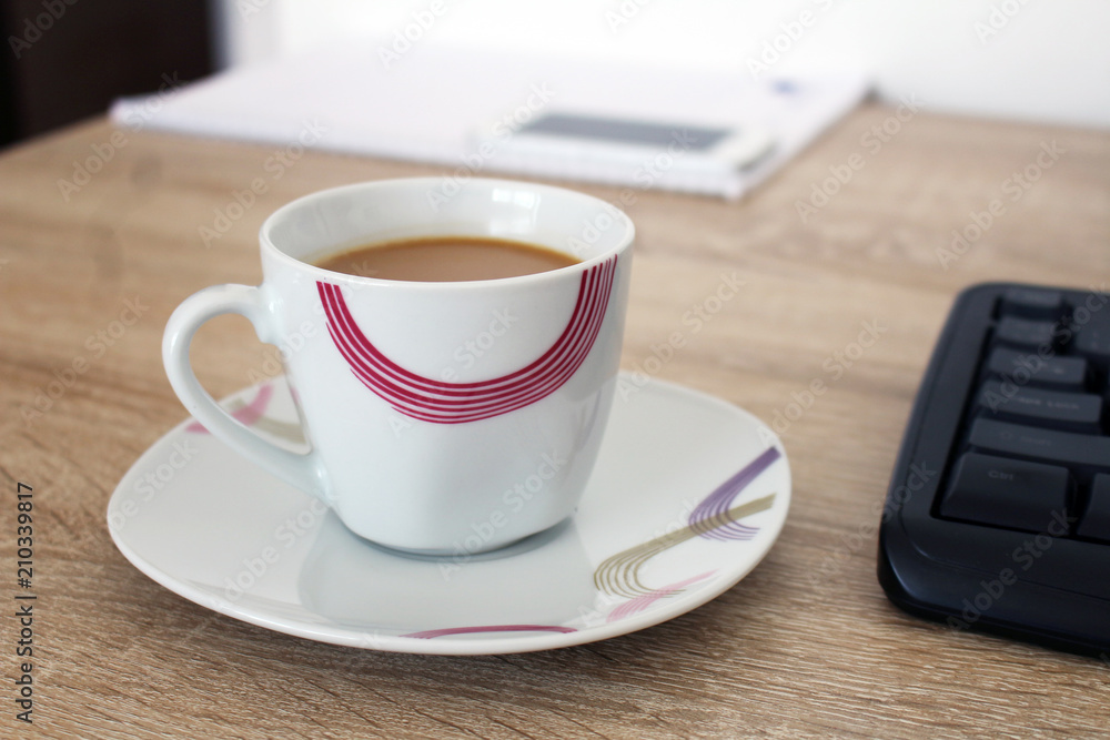 Relax in work with coffee in cup Relax in work with coffee in cup