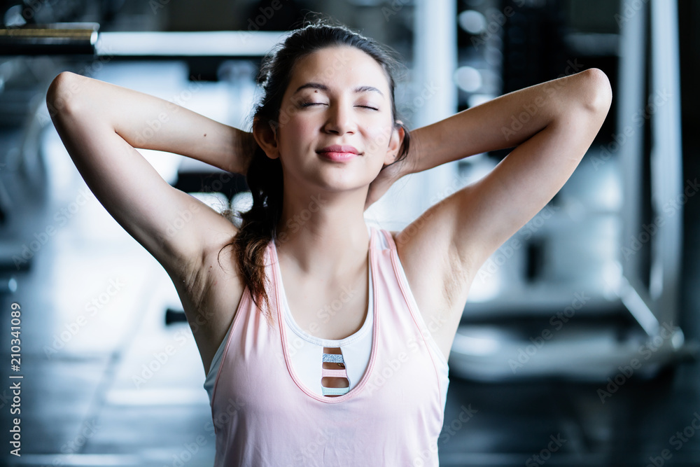 attractive woman exercise schedule time in gym workout with yoga lesson attractive woman exercise schedule time in gym workout with yoga lesson
