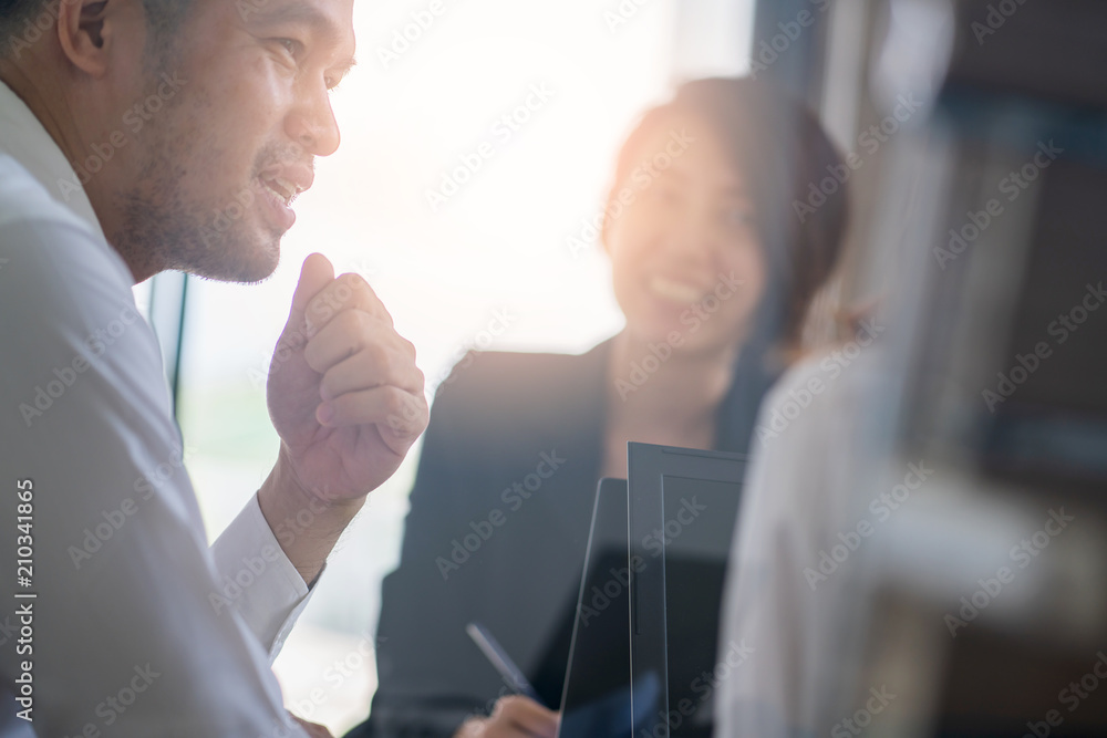 Business partners showing team work while working in meeting room at office interior Business consultant concept. Team work and successful project. Business partners showing team work while working in meeting room at office interior Business consultant concept. Team work and successful project.