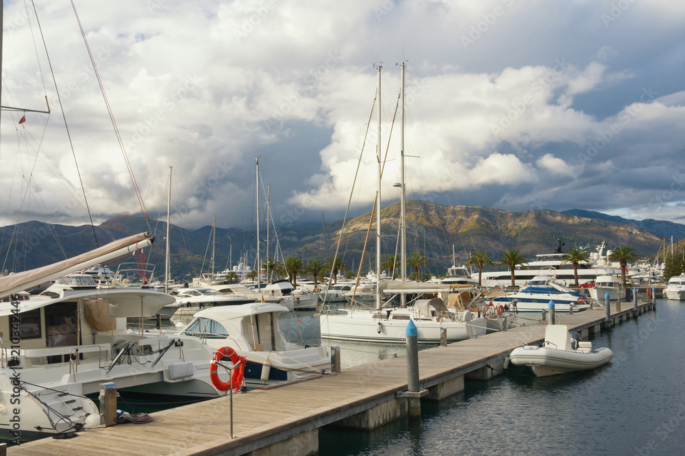 Cloudy autumn day in port. Montenegro, Tivat city. View of yacht marina of Porto Montenegro