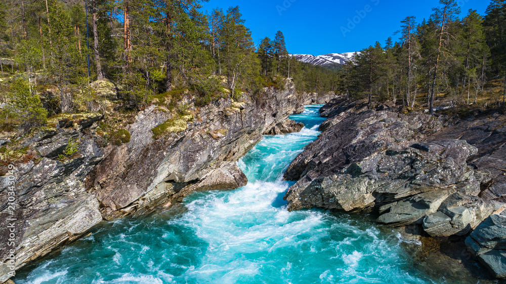 Mountain river in spring. Hordaland, Norway.