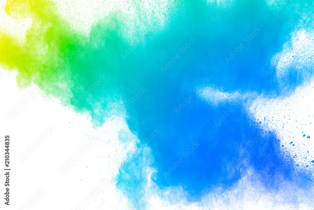 Abstract multi color powder explosion on white background. Freeze motion of dust particles splashing. Painted Holi in festival Abstract multi color powder explosion on white background. Freeze motion of dust particles splashing. Painted Holi in festival