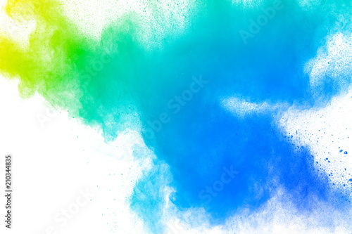 Fototapeta Naklejka Na Ścianę i Meble -  Abstract multi color powder explosion on white background.  Freeze motion of  dust  particles splashing. Painted Holi in festival
