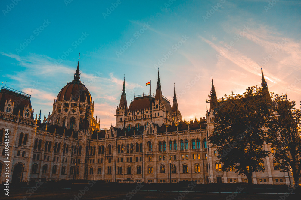 Parliament of Hungary in the afternoon with warm colored sky