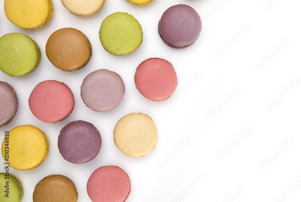 A Variety of French Macarons Flavors on a White Background A Variety of French Macarons Flavors on a White Background