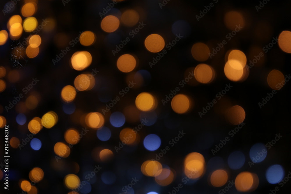 Obraz premium Bokeh background colorful of merry christmas, Happy new year bokeh lighting shine on night background, Bokeh glitter light, Glittering wallpaper