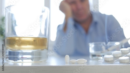 Disappointed Man After Medical Pills and Alcohol Abuse