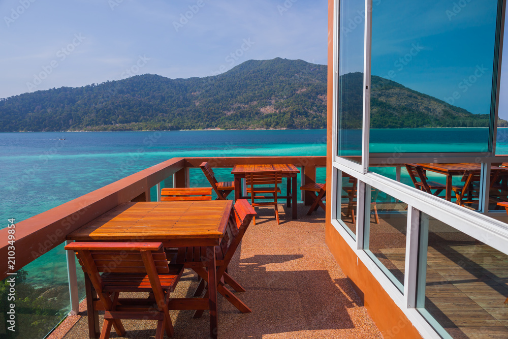 Interior of modern restaurant with sea view background at tropicana Interior of modern restaurant with sea view background at tropicana