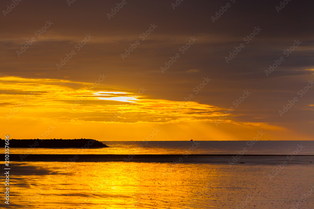 Colorful sky of sunrise on the beach located at hua-hin south of thailand Colorful sky of sunrise on the beach located at hua-hin south of thailand