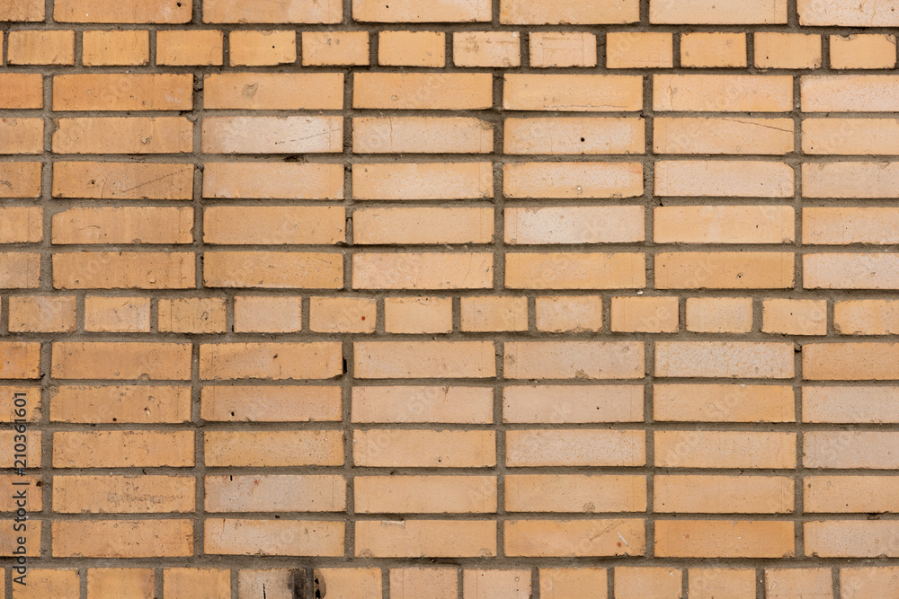 Obraz premium Yellow masonry brick texture