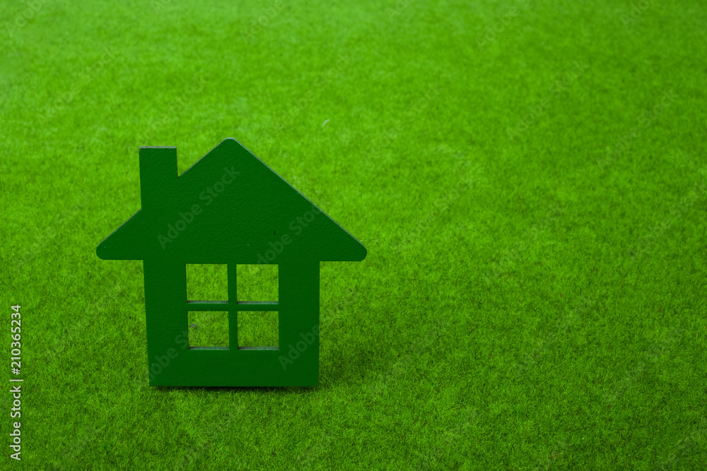 House on green grass background House on green grass background