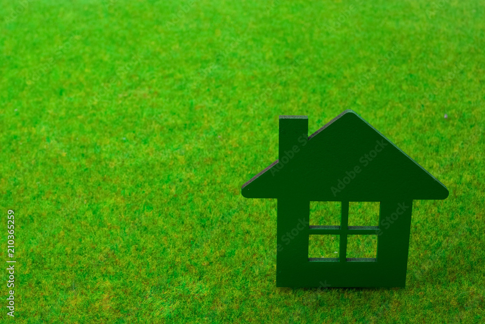 House on green grass background House on green grass background