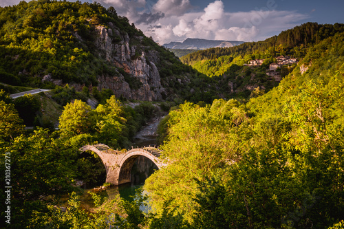 Bild auf Leinwand Plakidas Bridge with Kipi village on background
