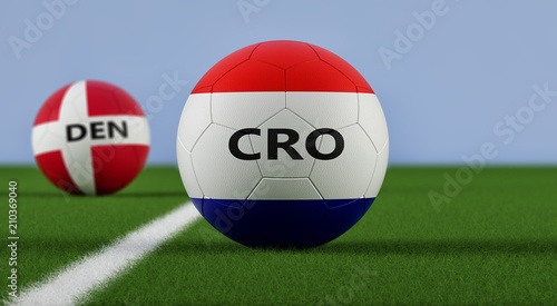 Croatia vs. Denmark Soccer Match - Soccer balls in Croatia and Denmarks national colors on a soccer field. Copy space on the right side - 3D Rendering 