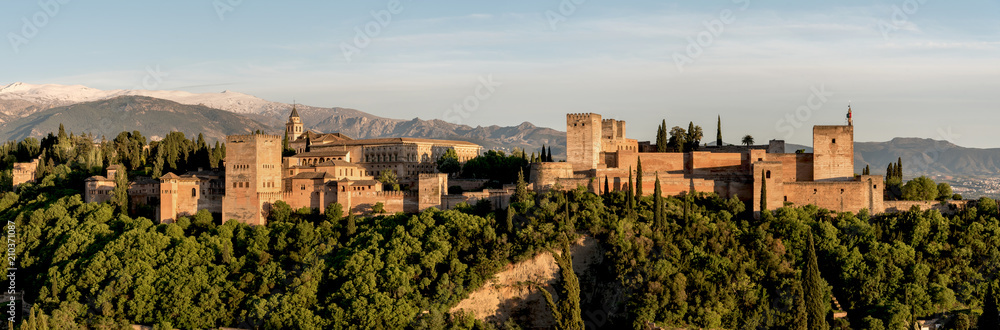 Panoramic view of Alhambra in Granada with Sierra Nevada. Palacios Nazaríes, Palace of Charles V, Alcazaba. Andalusia, Spain