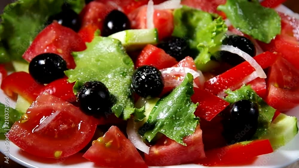 Tomatoes with olives close-up turn around Tomatoes with olives close-up turn around