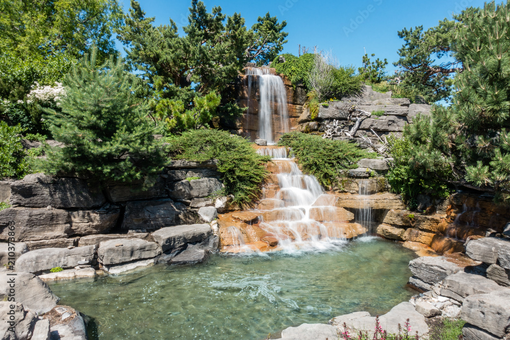 Naklejka premium Nature Oasis Waterfall