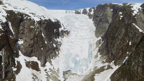 Tuftebreen - glacier in Norway is nearby to Steinmannen and Bakli. Aerial view. photo